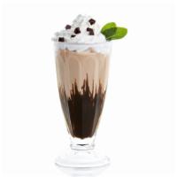 Black & White Milkshake · Vanilla & Chocolate swirled milkshake topped with whipped cream.