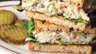 Tuna Salad Sandwich · Homemade tuna salad, with arugula, red onions, and sliced tomato on your choice of bread.