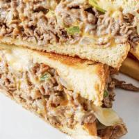 Grilled Cheese Steak · shredded steak, grilled onions & peppers, provolone cheese, and American cheese on grilled T...