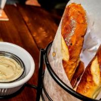 Bavarian Style Pretzels · Three long salted pretzels w/mustard for dipping.
