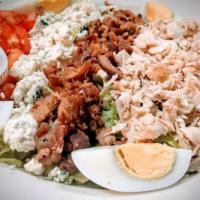 Cobb Salad · Turkey, avocado, bacon, tomato and hard-boiled egg with crumbled blue cheese and romaine let...