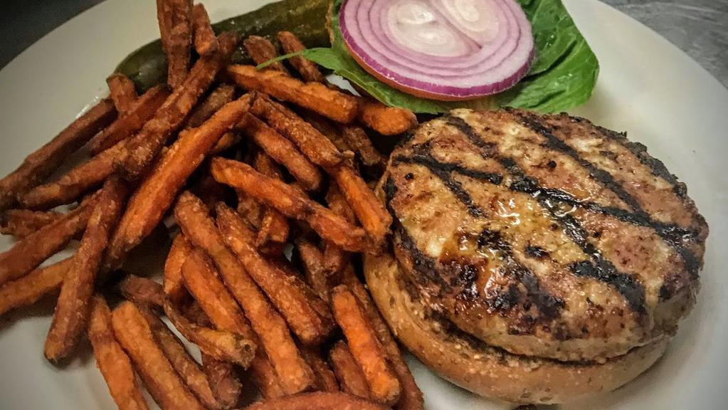 Turkey Burger · Served with lettuce, tomato, and red onion on a multi-grain roll with sweet potato fries.