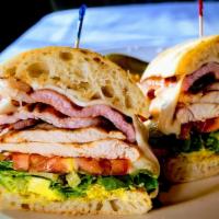 Station Sandwich · Chicken breast topped with Irish bacon, swiss cheese (avocado), shredded lettuce, sliced tom...