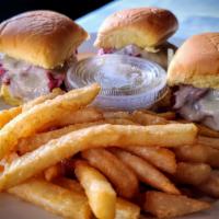 Corned Beef Sliders · Three thinly sliced corned beef sliders. Topped with sauerkraut, Russian dressing and melted...