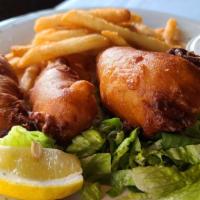 Fish & Chips · Filet of North Atlantic cod, beer battered and deep-fried. Served with french fries, cole sl...