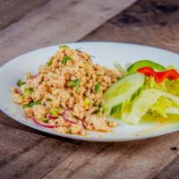 Chicken Larb Salad · Spicy. Minced chicken seasoned with herbs, onion and chili tossed in lime juice.