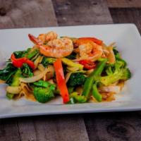Drunken Noodles · Most popular. Spicy.  Sautéed flat rice noodles with chili paste, bell pepper, onion, brocco...