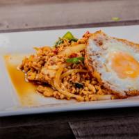 Traditional Thai Basil With Sunny  Side Egg · Mince chicken or Pork , Thai Basil, Thai chilies, bell Peppers, onion, garlic