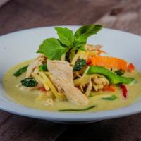 Green Curry · Spicy. Fresh green chili paste with bamboo shoot, bell pepper carrot basil leaves, and cocon...