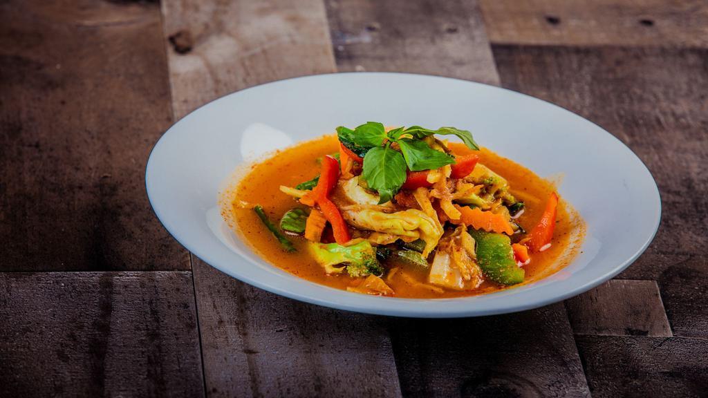 Jungle Curry · Red curry chili paste, bamboo shoot , red bell peppers, carrots, string beans, Rhizome root , Thai basil , veggie broth .