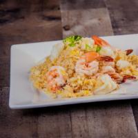 Sea Fried Rice · Egg, shrimp and calamari combination.