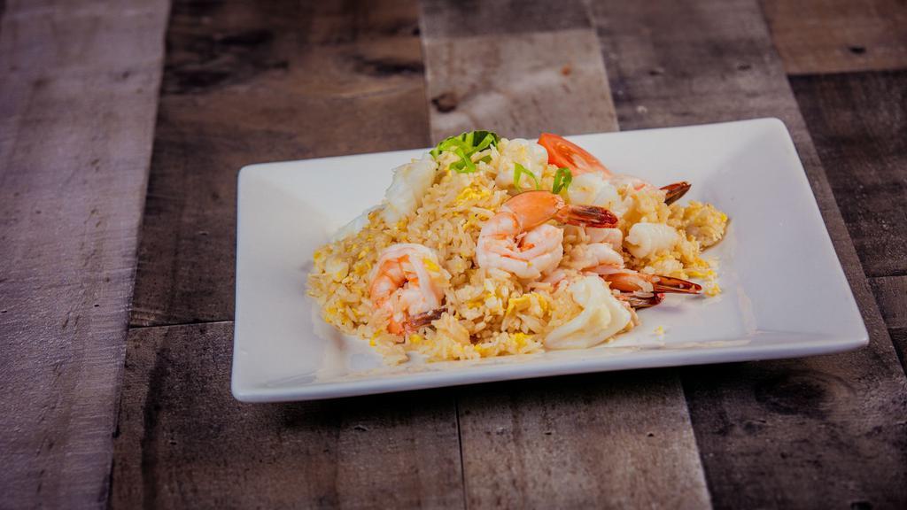 Sea Fried Rice · Egg, shrimp and calamari combination.
