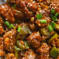 Chili Chicken + Rice · Indian-Chinese Szechuan fusion dish, diced chicken that's sweet, savory, and spicy all at on...