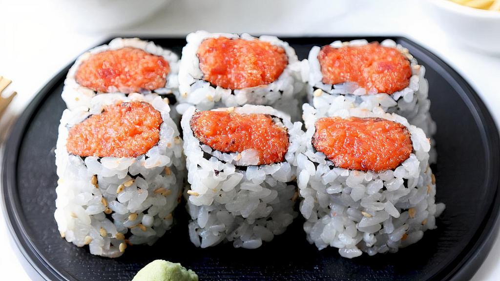 Spicy Tuna Roll · 8pc inside out roll with cucumber and avocado.