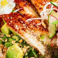 Voodoo Poke Bowl · Soy lime marinated fresh salmon or tuna mixed in a sweet and creamy voodoo sauce with avocad...
