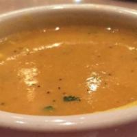 Mulligatawny Soup · Made with lentils, tomatoes, and a touch of specially blended spices and herbs.