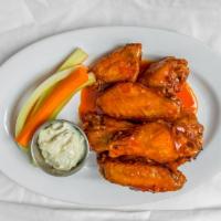 Special Chicken Wings · Blue cheese dressing, celery and carrots sticks.