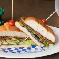 Tortas · Served with beans, lettuce, tomato, onions, avocado, mayonnaise, chipotle or jalapeño and mu...