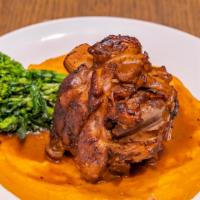 Chamorro · Braised pork shank in dark beer. Served with sweet potato puree and broccoli rabe.