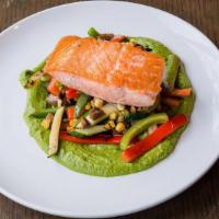 Salmon A La Plancha · Served with pea puree and sauteed season vegetables.