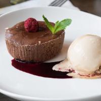 Molten Chocolate Cake · Served with rose petal gelato.