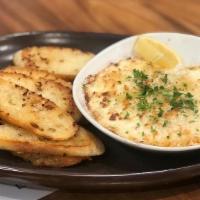 Crab And Artichoke Dip · Artichoke hearts, crabmeat, butter panko topping,
served warm with garlic bread