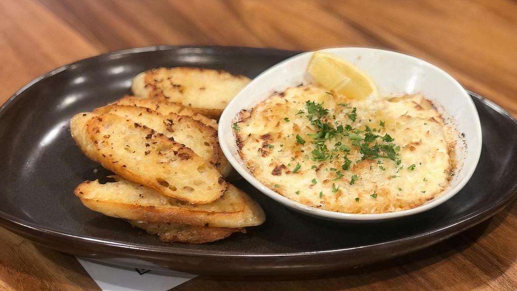 Crab And Artichoke Dip · Artichoke hearts, crabmeat, butter panko topping,
served warm with garlic bread