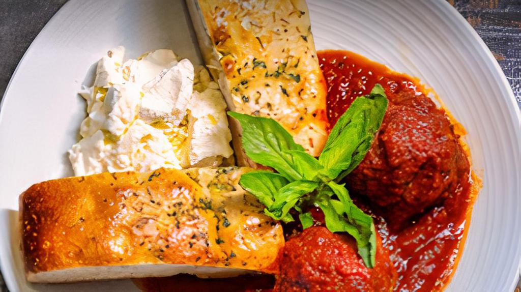 Meatballs & Homemade Ricotta · With a side of homemade rosemary focaccia.