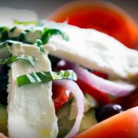 Caprese Salad · Fresh mozzarella, tomatoes, roasted red peppers, kalamata olives, fresh basil, artichoke hea...