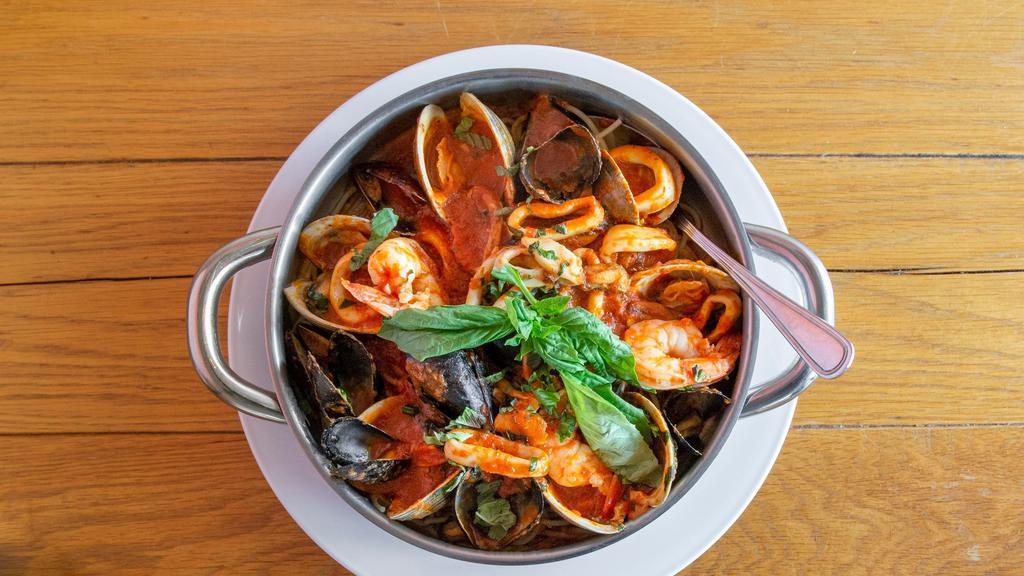 Spaghetti Frutti Di Mare · With mussels, clams, shrimp, and calamari in plum tomato sauce.