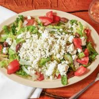 Greek Salad · Locally grown greens topped with Feta cheese, tomatoes, olives, onions, peppers, and radishe...