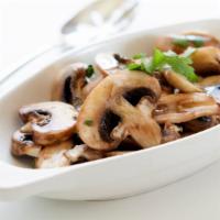 Sauteed Mushrooms · In garlic and wine sauce.