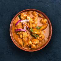 Aloo Gobi · Diced potatoes and cauliflower simmered with onion, tomato and cashew curry paste.
