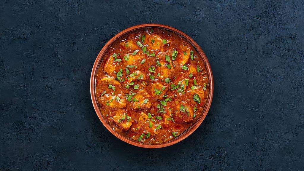 Chicken Tikka Masala · Oven-roasted chicken chunks in a rich creamy tomato and onion base gravy.