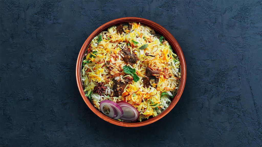 Lamb Biryani · Long grain basmati rice cooked with tender lamb and aromatic Indian herbs.