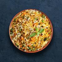 Vegetable Biryani · Long grain basmati rice cooked with farm-fresh vegetables and aromatic Indian herbs.