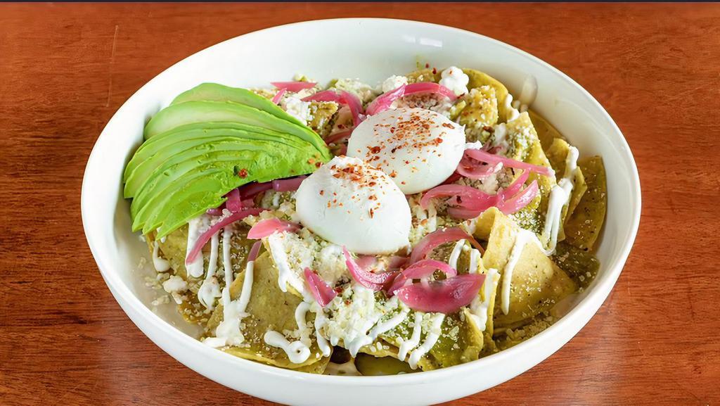Chilaquiles · Poached Eggs, Avocado, Pickled Onions, Cotija Cheese, Aleppo Pepper, Sour Cream, Tomatillo Green Sauce, Fried Tortilla
