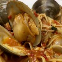 Whole Clams Over Linguine · 