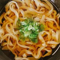 Kake Udon · Plain japanese style udon noodle soup topped with scallion.