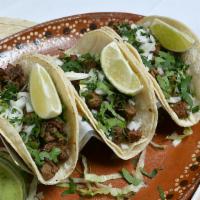 Tacos Tradicionales Mexicanos. · Corn tortilla filled lacus with chopped cilantro and onions choice of chicken steak chorizo,...