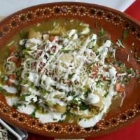 Enchiladas Verdes · Corn tortillas wrapped with chicken or steak baked in a tomatilla sauce served with rice and...