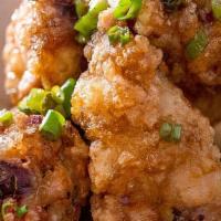 Mighty Wings (5) · Gluten free. Nuts. Potato starch coated wings, sweet ginger sauce, sesame seeds, scallion.
