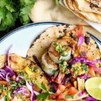 Malibu Shrimp Taco · shrimp, corn, salsa verde, cilantro, pickled cabbage