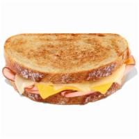 Grilled Ham & Cheese Melt · Toasted Sourdough bread with ham, white cheddar and American cheese.