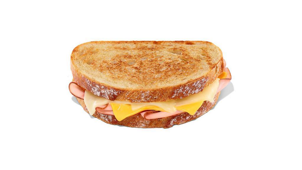 Grilled Ham & Cheese Melt · Toasted Sourdough bread with ham, white cheddar and American cheese.