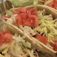 Tacos · Three soft corn tortillas with monterey jack cheese, tomatoes, salsa, and sour cream. Choice...