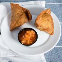 Samosa (2 Pieces) · Fried pastry with a savory filling, spiced potatoes and peas.