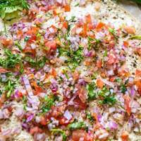 Masala Papad · Fried papad with tomato, cucumber, cilantro, onion, and chat masala.