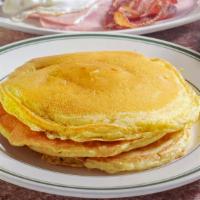 Victor’S Pancakes · Served with Ham, Bacon, Sausage and One eggs