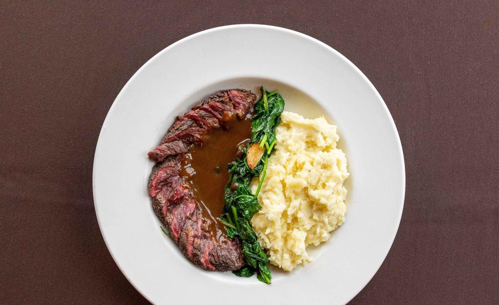 Hanger Steak · sliced steak, whipped potatoes, roasted garlic spinach, demi-glace